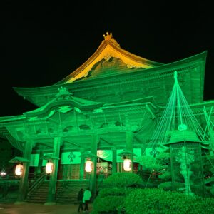 Zenkoji illuminated in green at Zenkoji Lantern Festival